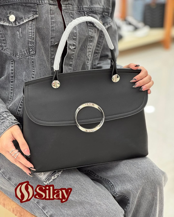 کیف زنانه چرم وارداتی یراق دایره ای مدل سلین مشکی