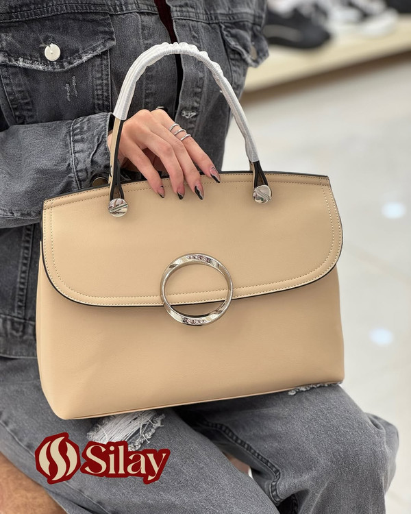 کیف زنانه چرم وارداتی یراق دایره ای مدل سلین کرم