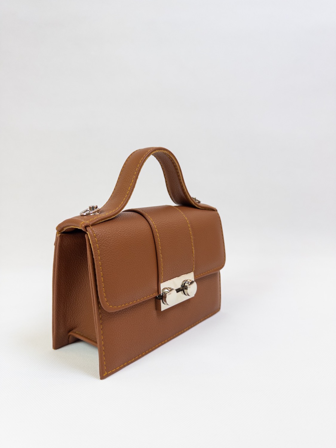 کیف زنانه یراق قفلی دو دکمه عسلی