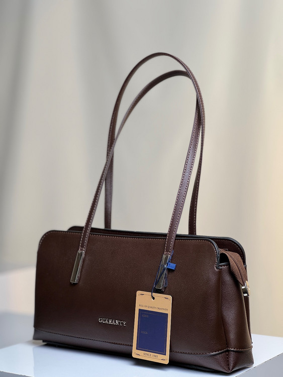 کیف زنانه چرم ترک وارداتی رنگ بندی قهوه ای