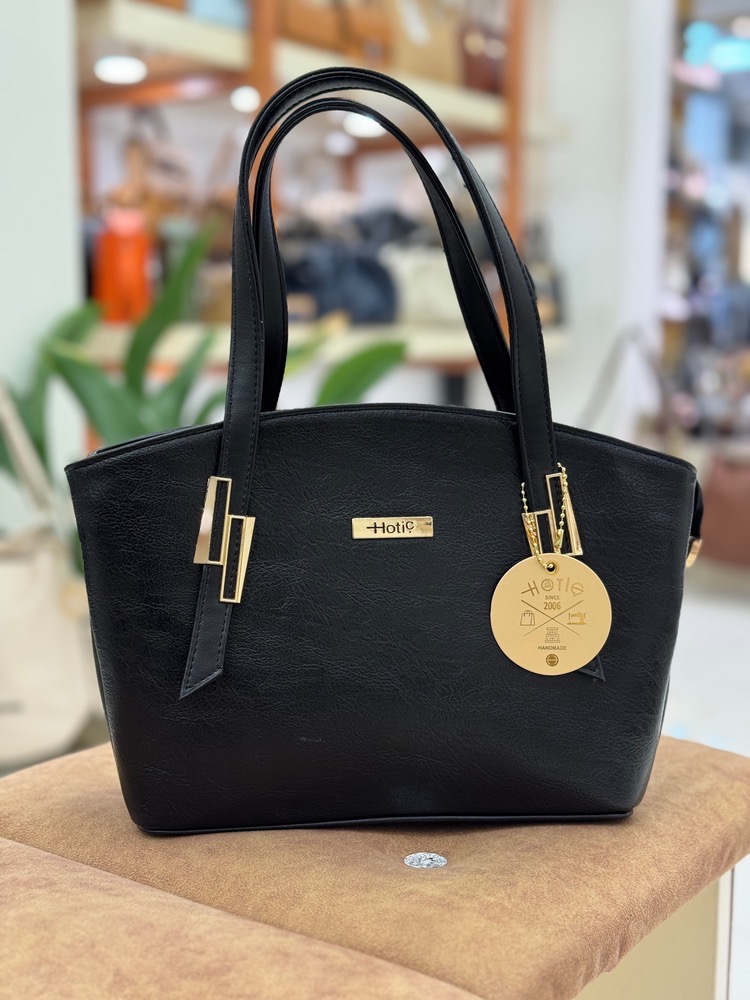 کیف زنانه رویه چرم وارداتی هاتیج کد 277 مشکی رویه فلوتر